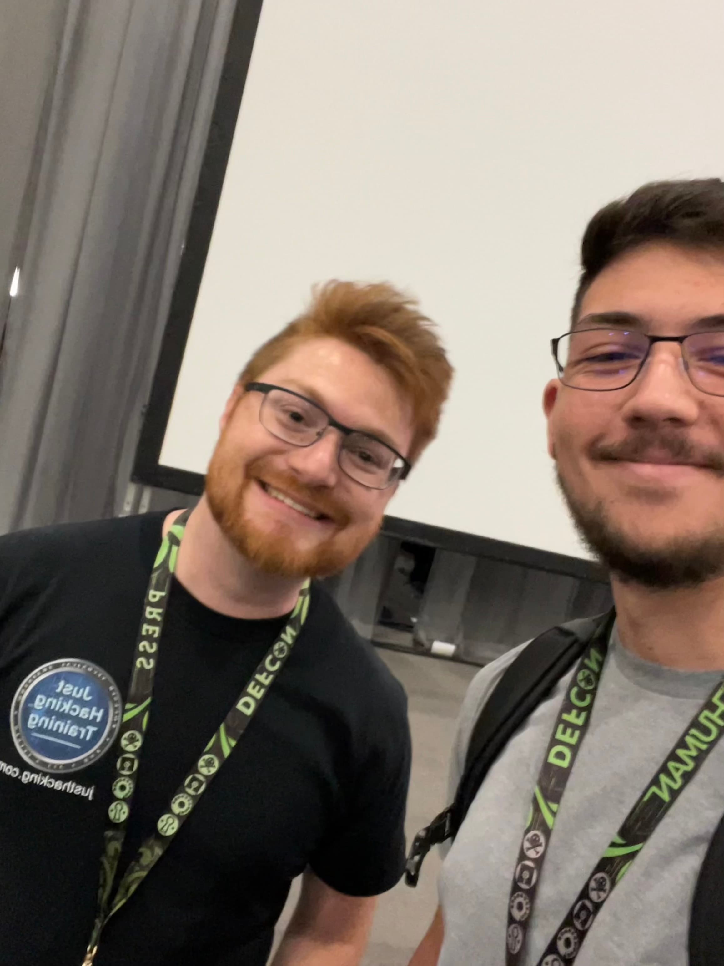 Ethan Lawson with John Hammond at DEF CON 33